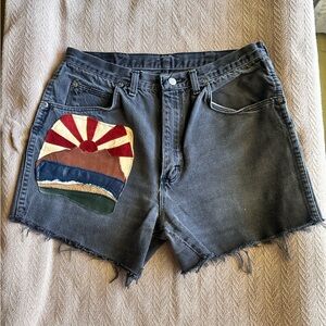 Vintage Wrangler Faded Black Jean Shorts with Colorful Patch
